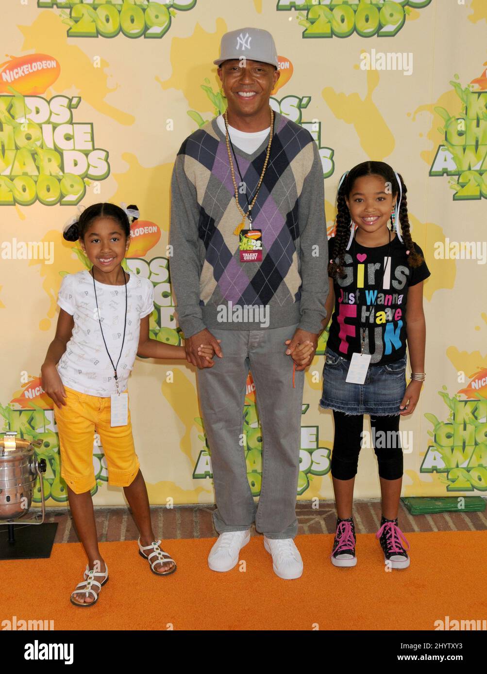 Russell Simmons and daughter's Aoki Lee and Ming Lee at Nickelodeon's 22nd Annual Kids Choice Awards held at UCLA's Pauley Pavilion, Westwood. Stock Photo