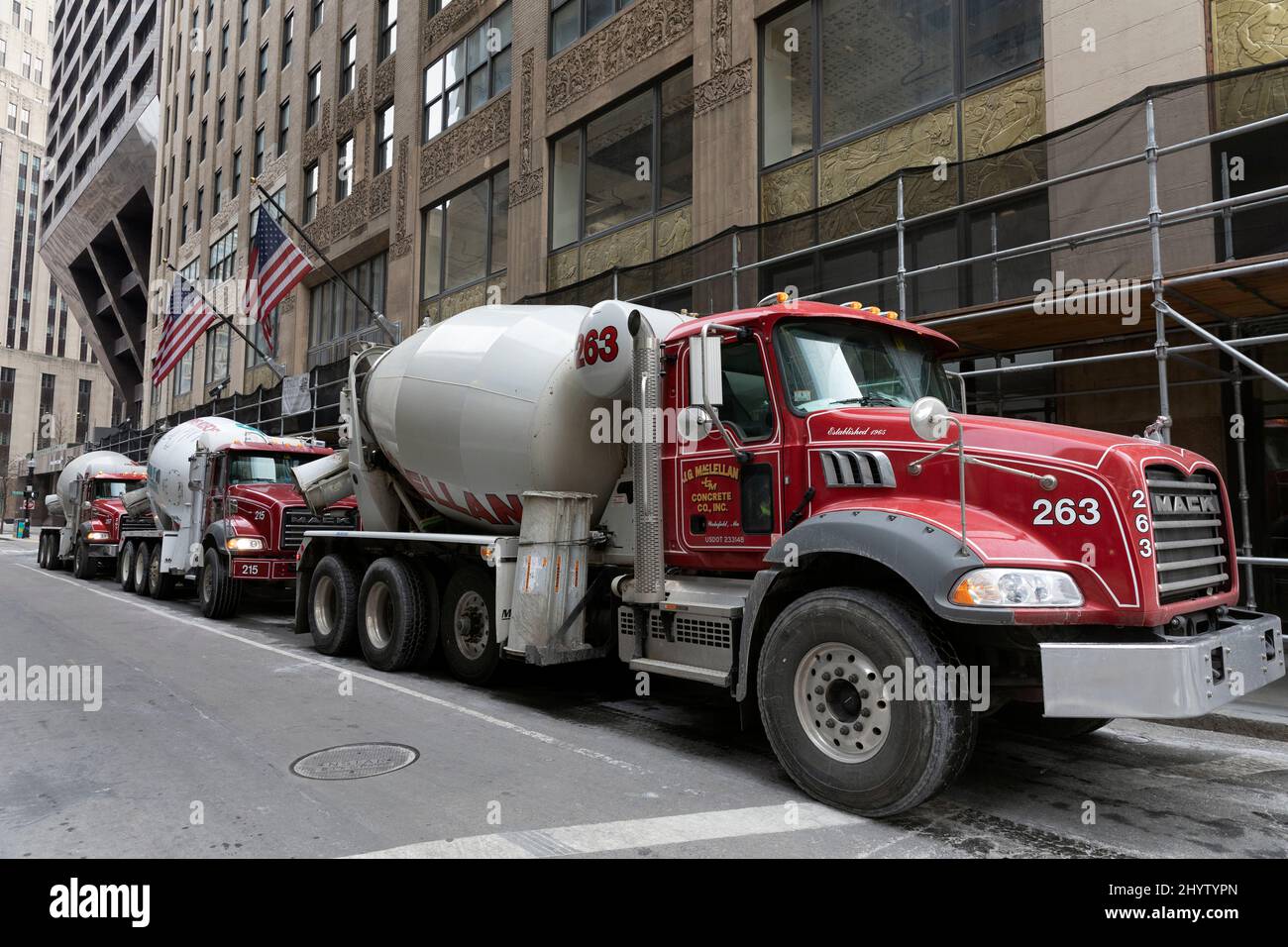 Cement trucks lined up at a construction site Boston Massachusetts Stock Photo
