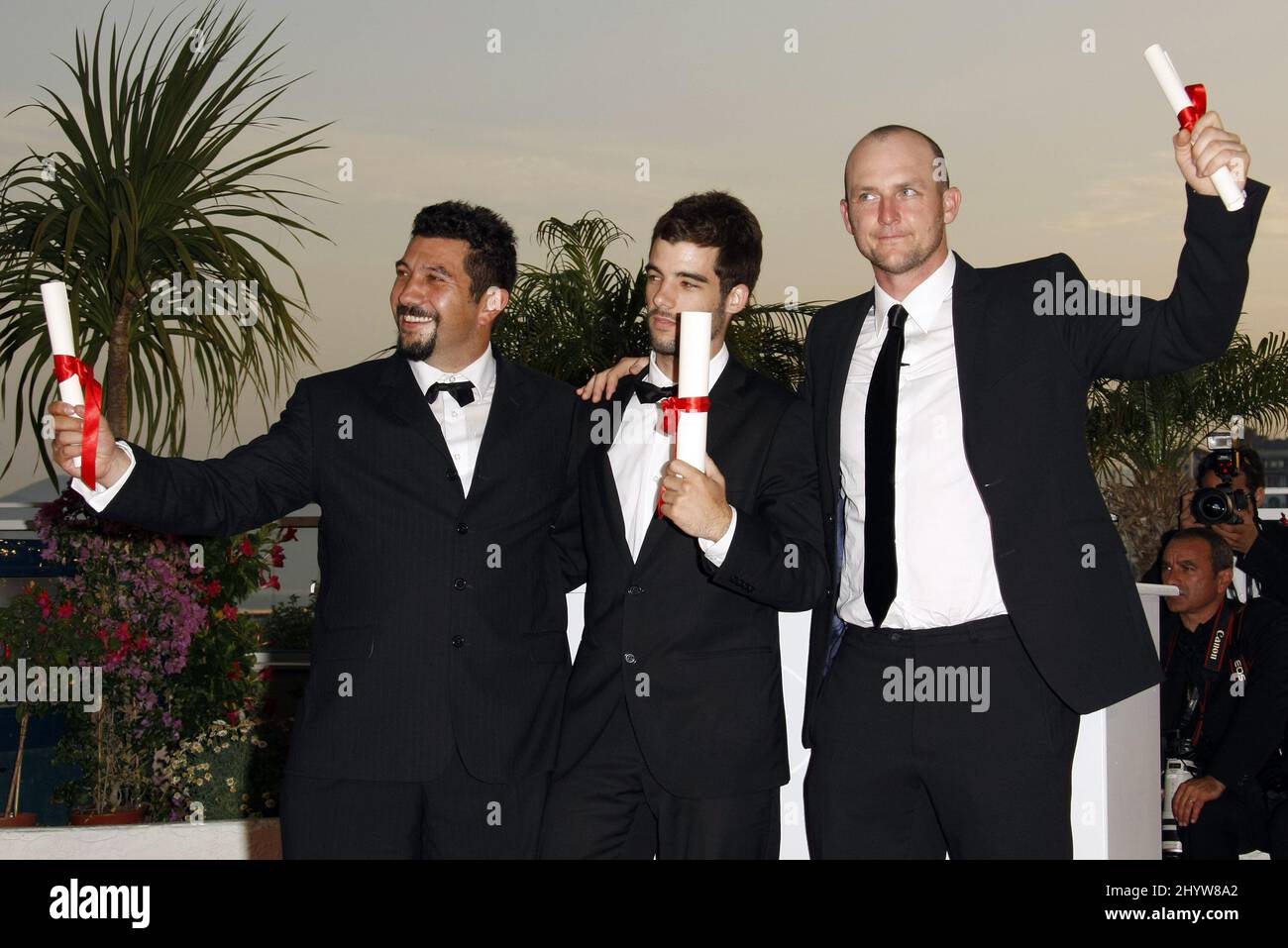 Directors Louis Sutherland (L) and Mark Albiston (R) with their Special Mention award for 'The Six Dollar Fifty Man' and director Joao Salaviza with his Palme d'Or Short Film award for 'Arena' as they attend the Palme d'Or Award Ceremony Photocall at the Palais des Festivals during the 62nd Annual Cannes Film Festival. Stock Photo