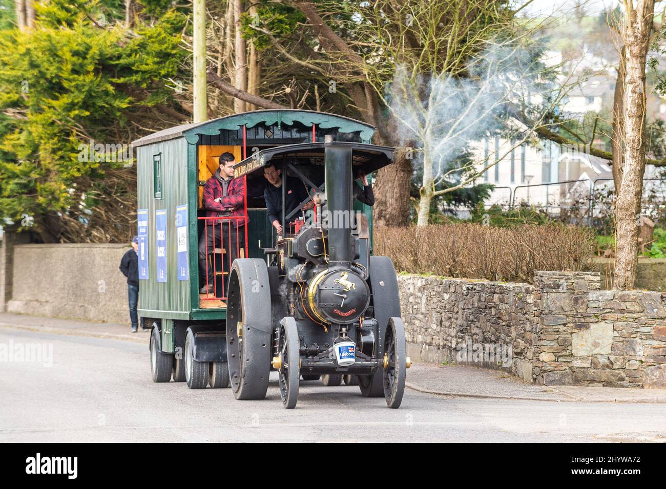 Clonakilty, West Cork, Ireland. 14th Mar, 2022. Steam traction engines set out from Rosscarbery today, continuing on their journey to the St. Patrick's Day parade in Kinsale on Thursday in aid of the RNLI. The traction engines arrived at Clonakilty Model Railway Village for a break before heading into Clonakilty town to raise funds for the RNLI. Credit: AG News/Alamy Live News Stock Photo