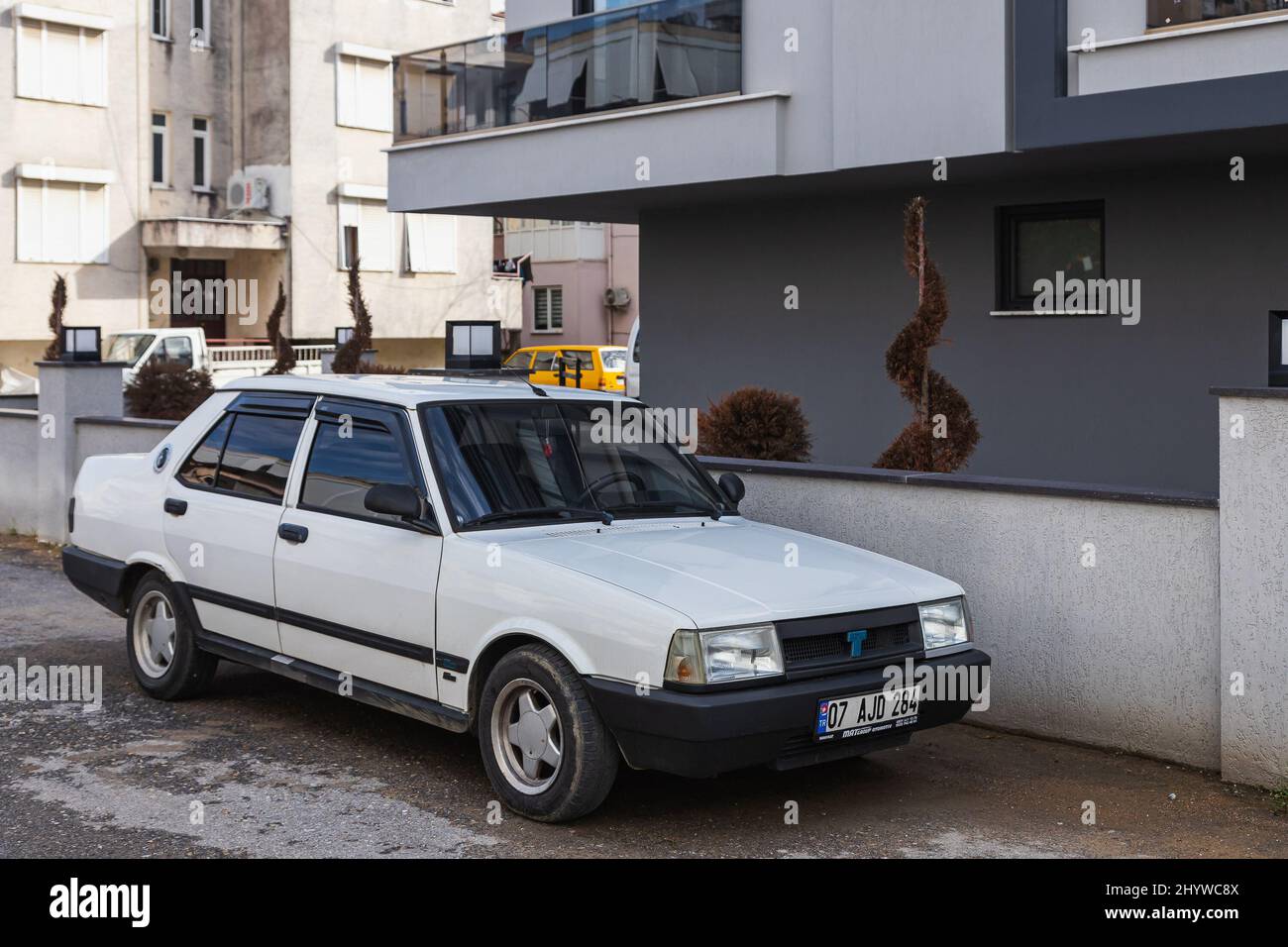 Side, Turkey -February  20, 2022:   white   Tofas  Dogan  is parked  on the street on a warm  day Stock Photo