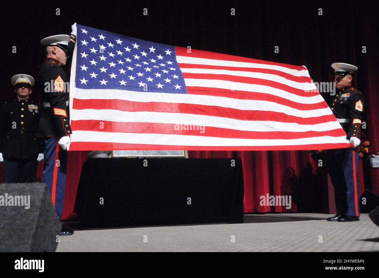 An American flag is held at the Academy of Television Arts and Sciences, Hollywood as NBC hosts a celebration of Ed McMahon's Life. Stock Photo