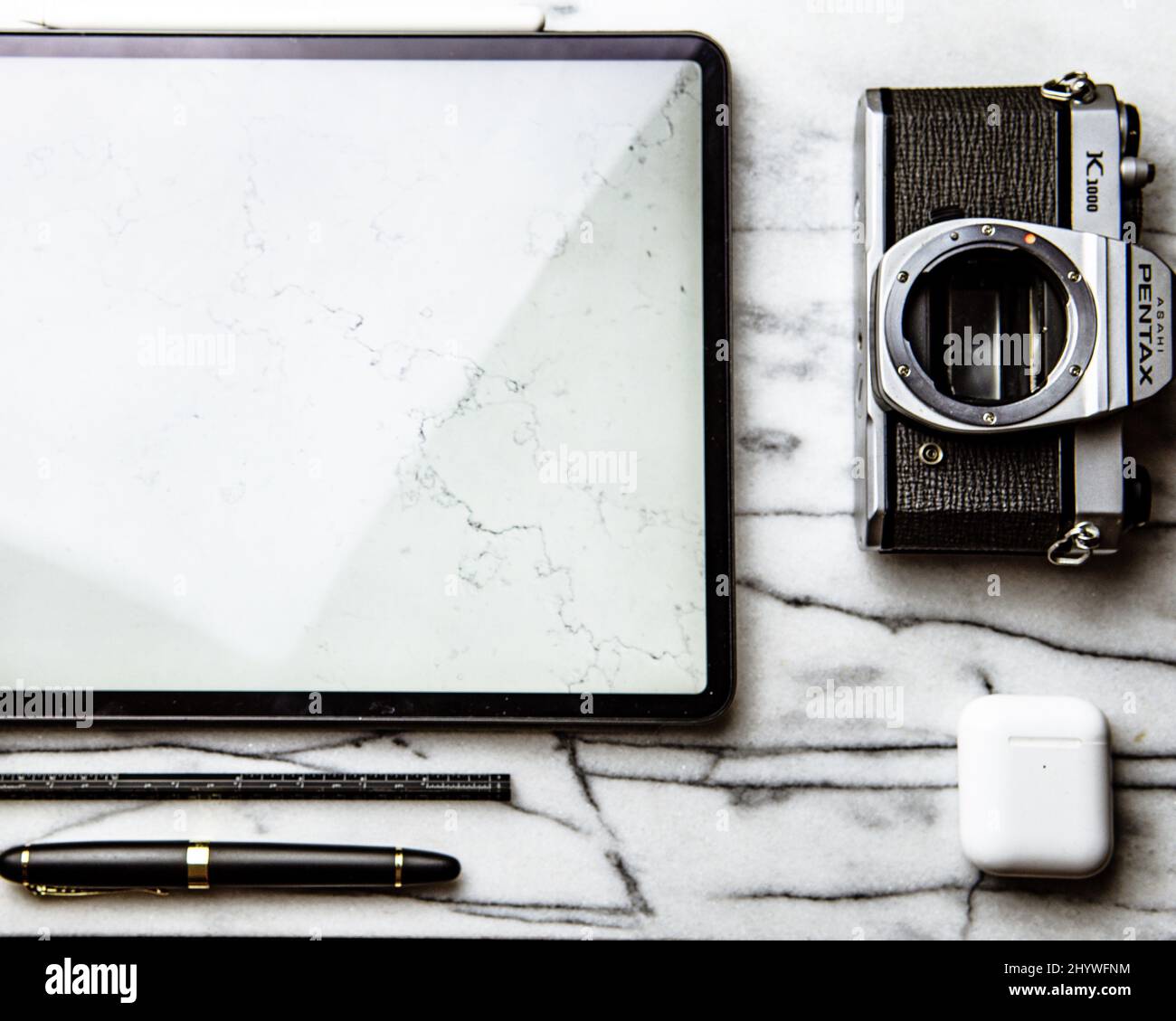 Desk with multiple objects on it Stock Photo - Alamy