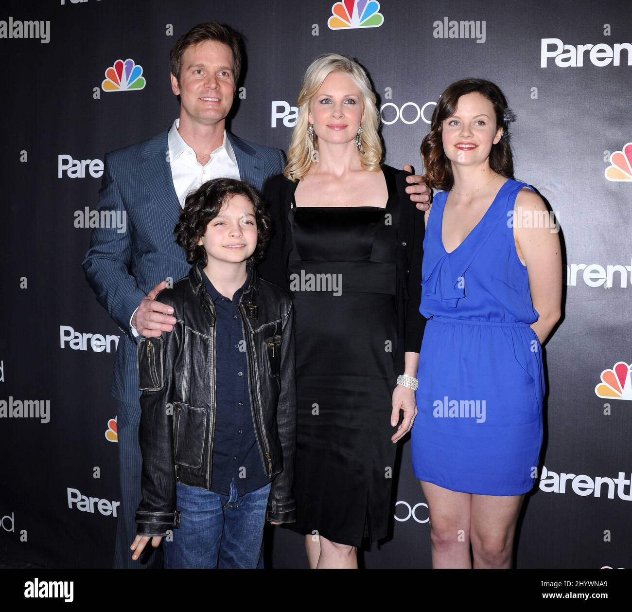 Peter Krause, Max Burkholder, Monica Potter and Sarah Ramos during NBC Universal's 'Parenthood' Premiere Screening at the Director's Guild of America Theatre, California Stock Photo