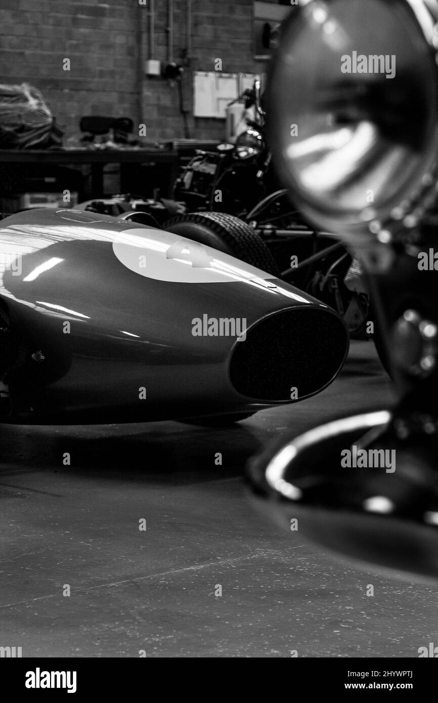 Grayscale shot of the front part of an old Formula 1 race car Lotus 49 Stock Photo