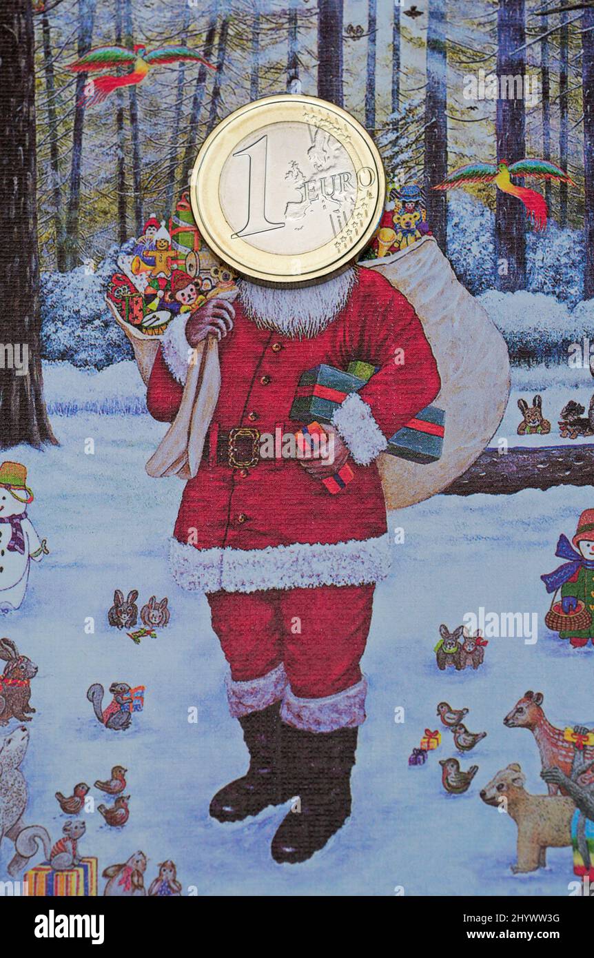 santa claus christmas card with one euro coin on his face Stock Photo