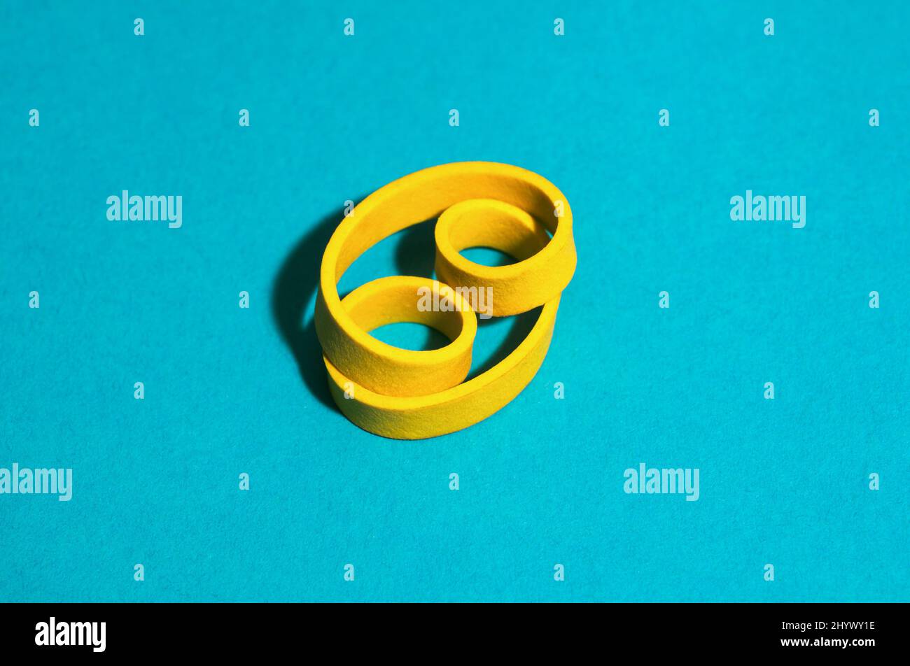 Yellow Rubber Band Stock Photo - Alamy