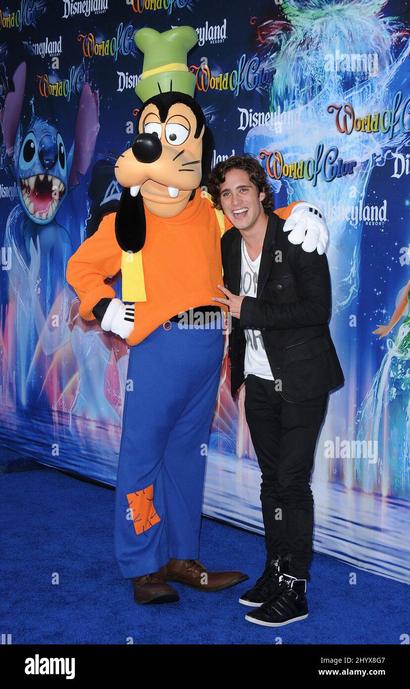 Goofy and Diego Boneta during Disney's 'World of Color' a nighttime water spectacular at the Disneyland Resort, Florida Stock Photo