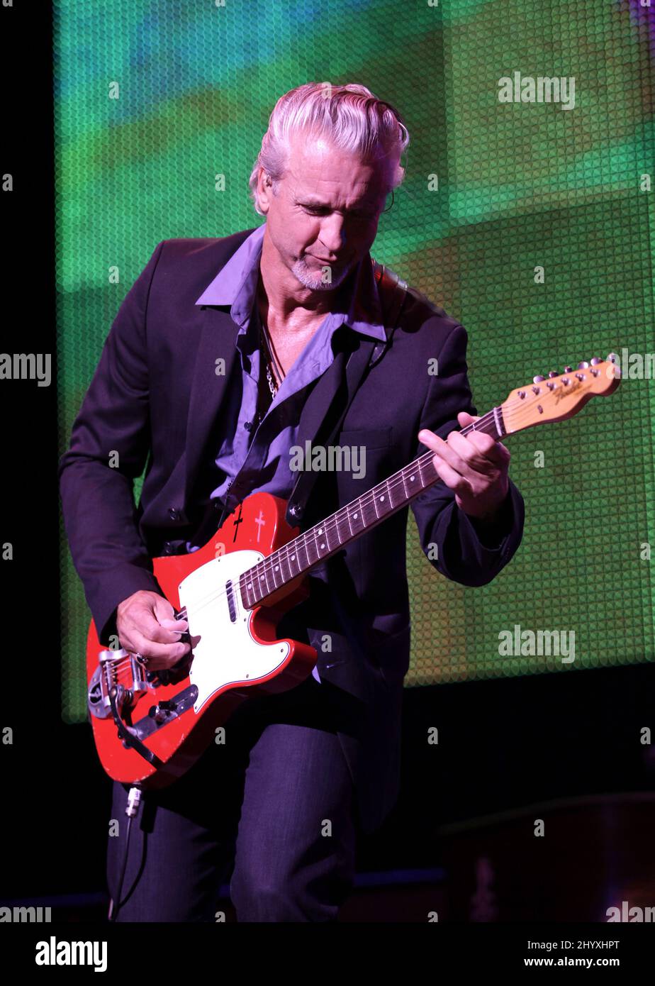 Neil Giraldo from REO Speedwagon performs during the Pat Benatar and ...