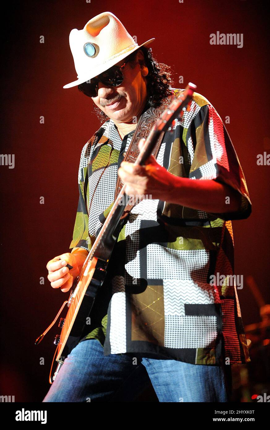 Carlos Santana ' performs as part of the 'Universal Tone Tour 2010' concert  held at the Time Warner Cable Music Pavilion in Raleigh, North Carolina  Stock Photo - Alamy