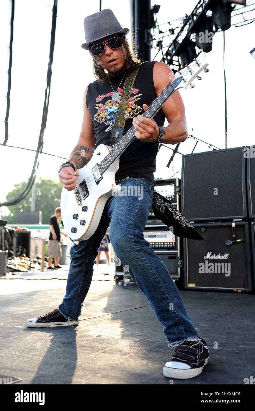 Paul Phillips from Puddle of Mudd performs during the Carnival of Madness Tour with Puddle of Mudd held at the Raleigh Boutique Amphitheatre in North Carolina, USA. Stock Photo