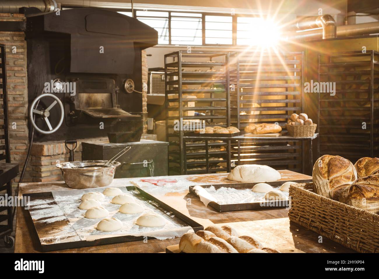Interior of bakery with back lit emitting from window Stock Photo