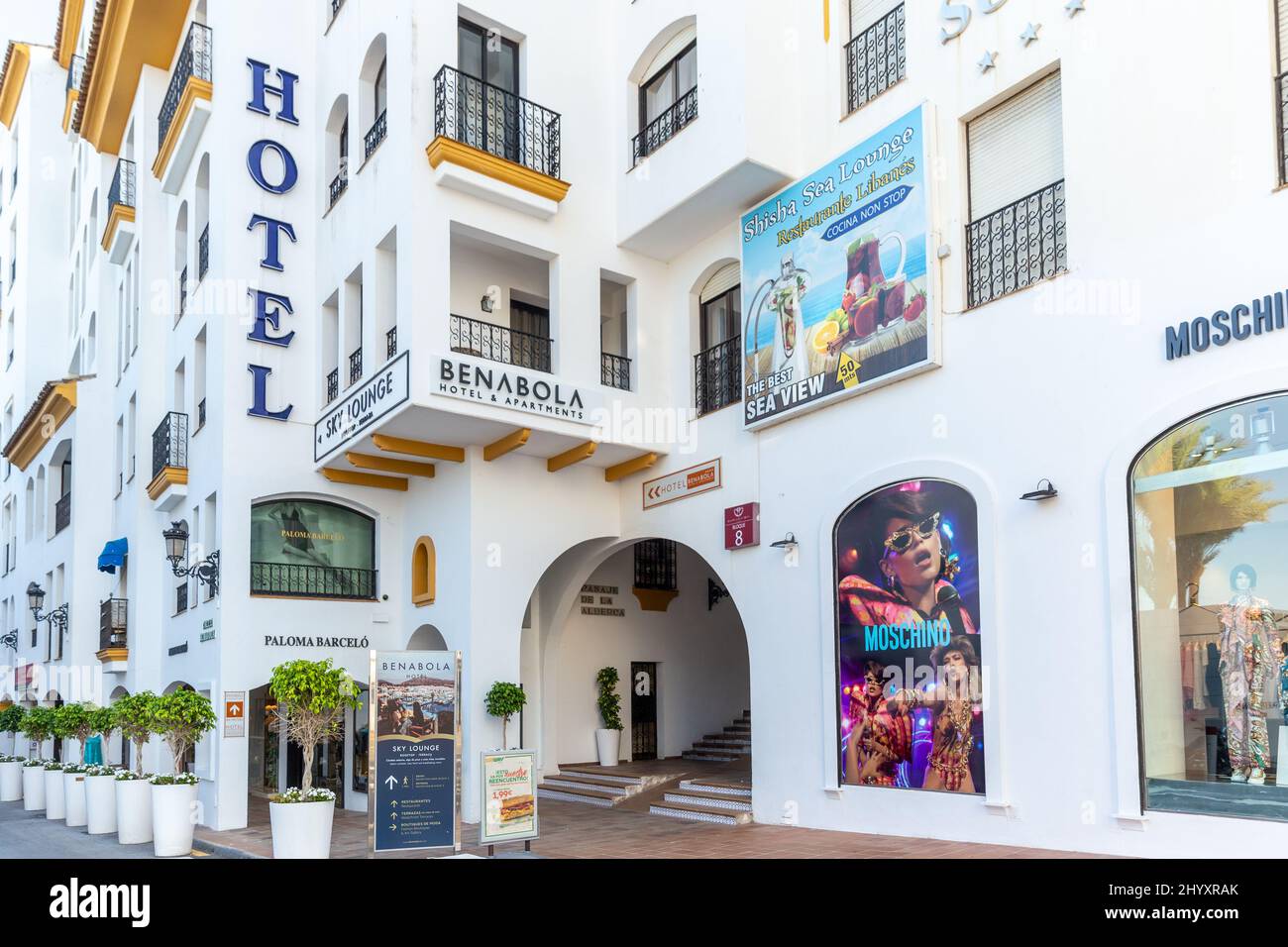 Puerto Banus street with white houses and luxury Hotel Benabola with Moschino Store. The most expensive and luxury location of Marbella. Lifestyle on Stock Photo