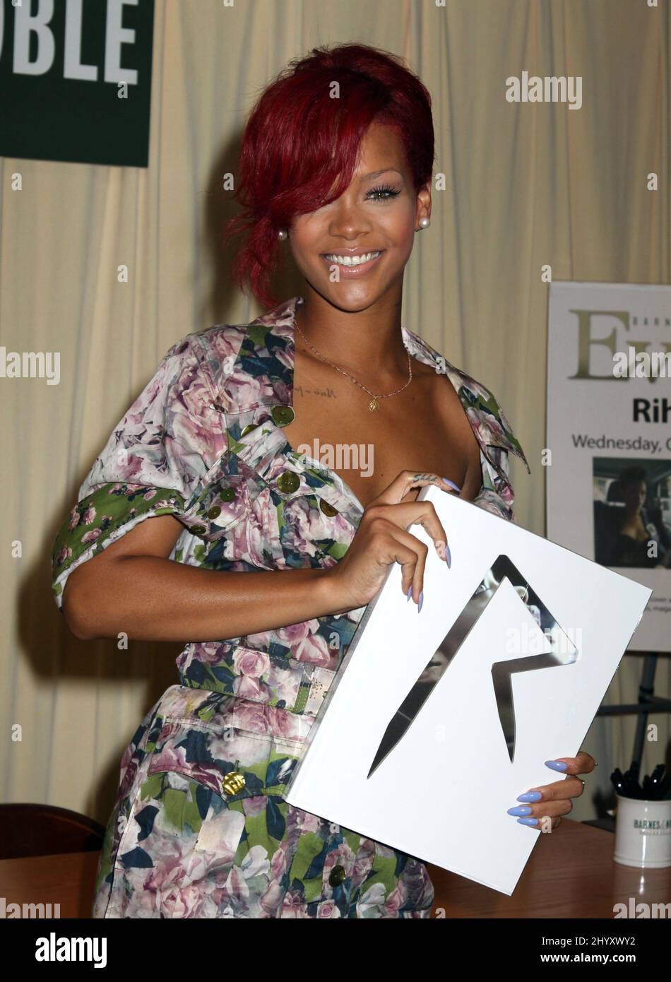 Rihanna signs copies of her new book 'Rihanna: The Last Girl on Earth' at Barnes and Noble store on 5th Avenue in New York, USA. Stock Photo