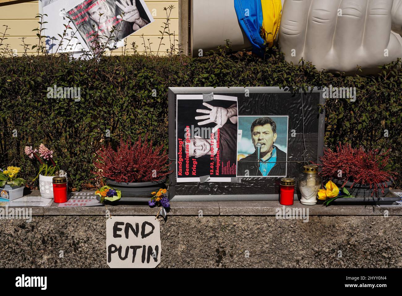 Protest sign against the Russian war in Ukraine in front of a residential building in Munich. In front of of the house where Irina Revina Hofmann live. Stock Photo