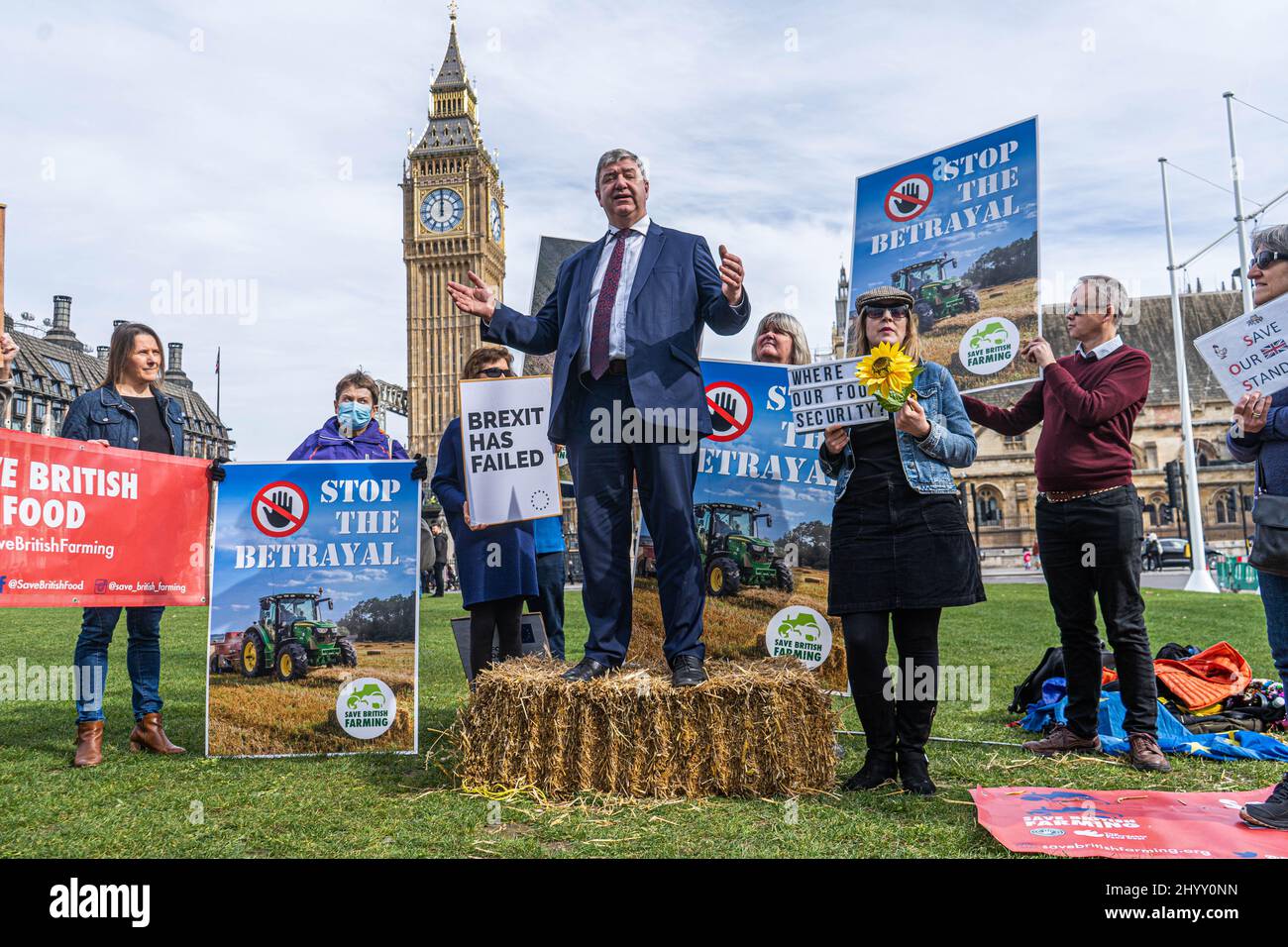WESTMINSTER LONDON, UK. 15  March, 2022 . Liberal Democrats MP,  Alistair Carmichael of Orkney ad Shetland addresses  a   Save British Food rally  in Parliament  Square   to support local  farmers, consumers and members of the food production industry across Britain neglected by the government  against  the Australian and New Zealand trade deals which fail to protect British animal welfare and environmental standards for imports Credit: amer ghazzal/Alamy Live News Stock Photo
