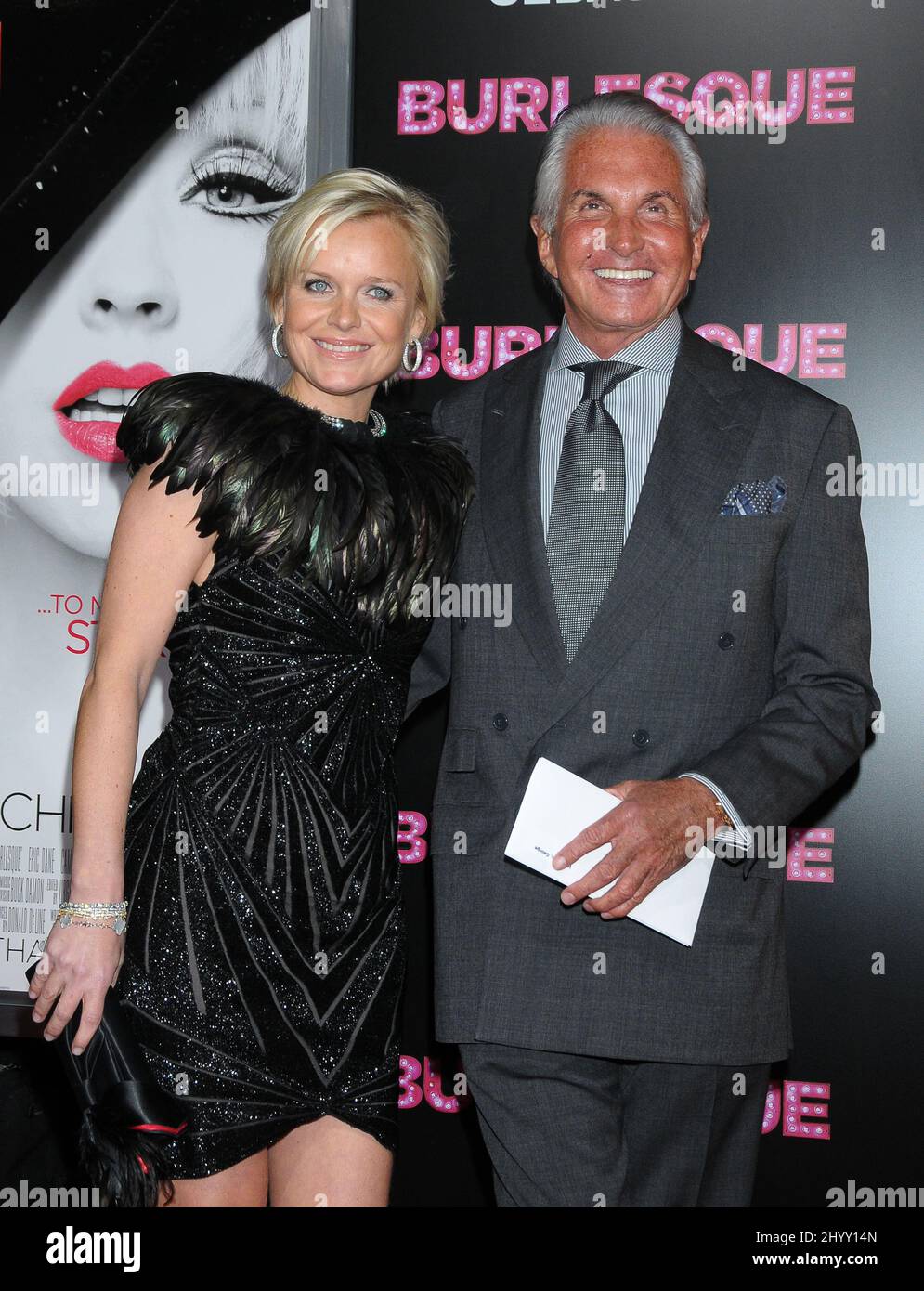 George Hamilton and Barbara Sturm at the 'Burlesque' Los Angeles premiere held at Grauman's Chinese Theatre, California. Stock Photo