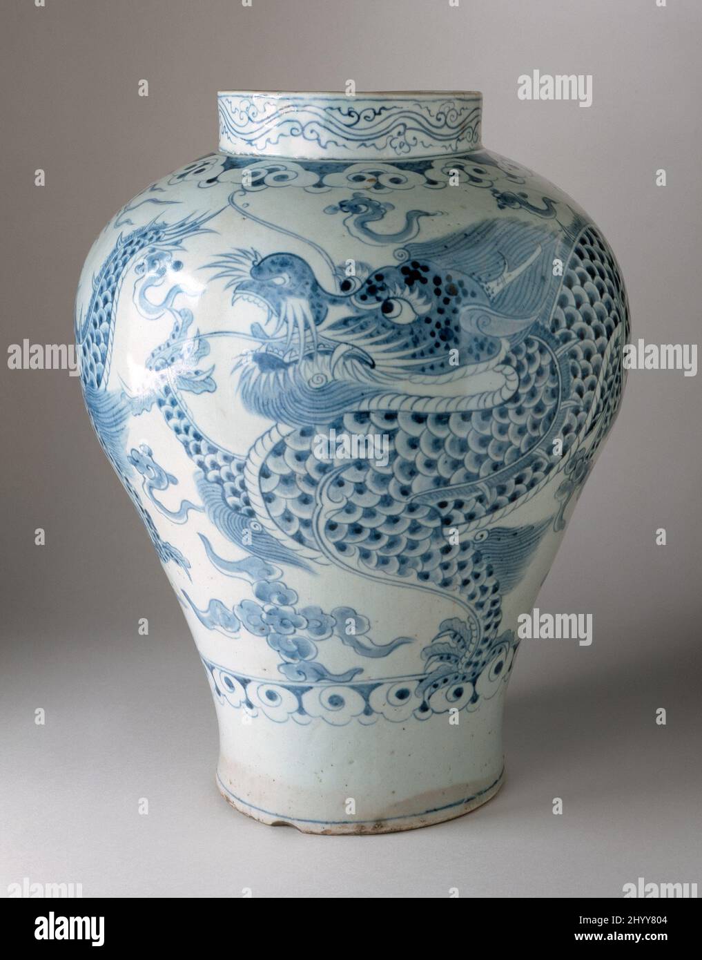 Jar with Dragon in Clouds Design in Underglaze Cobalt - blue. Korea, probably Gwangju and South Jeolla, Korean, Joseon (1392-1910), 18th century. Furnishings; Serviceware. Wheel-thrown porcelain with blue painted decoration under clear glaze Stock Photo