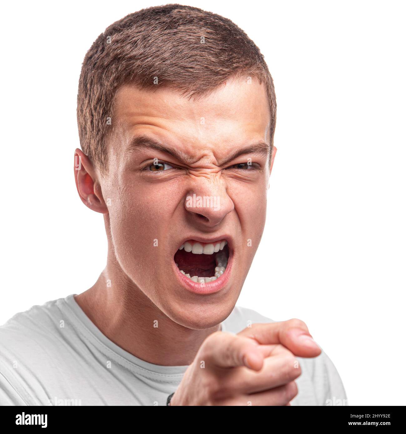 Aggressive young man points his finger. Stock Photo