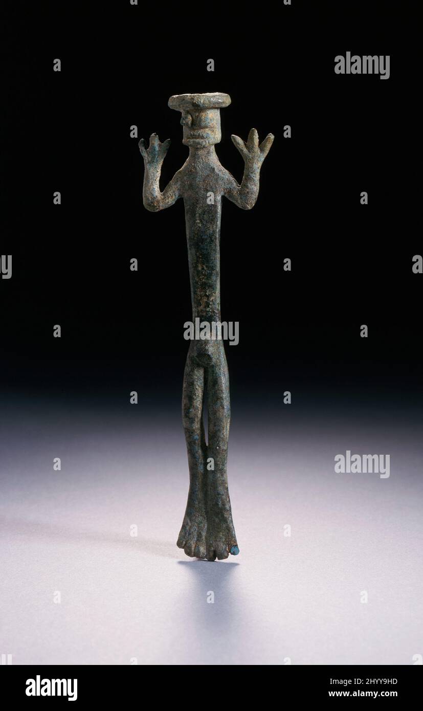 Lime Spatula in the Form of a Man. Indonesia, Dongson Culture, 100 B.C. - A.D. 300. Tools and Equipment; servers. Copper alloy Stock Photo