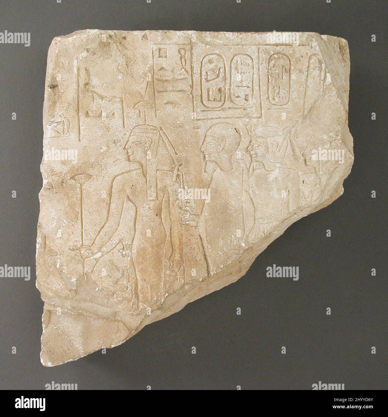 Relief Fragment Depicting Imenet, Ptah and Amenhotep I. Egypt, New Kingdom (1569 - 1081 BCE). Sculpture. Limestone Stock Photo