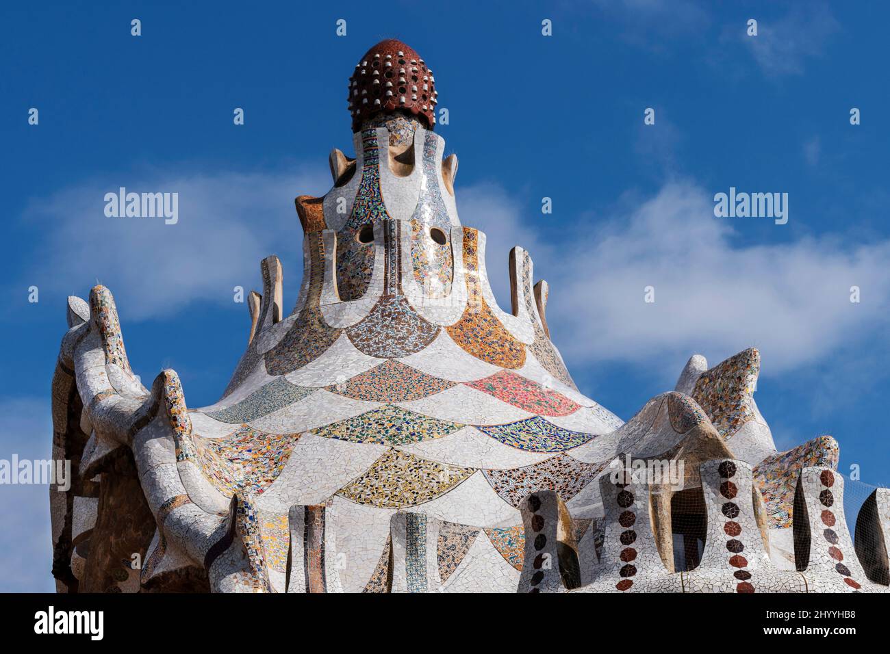 PARK GUELL BARCELONA CATALONIA SPAIN COLOURFUL GAUDI MOSAICS ON THE ROOF OF THE PORTERS LODGE BUILDING Stock Photo