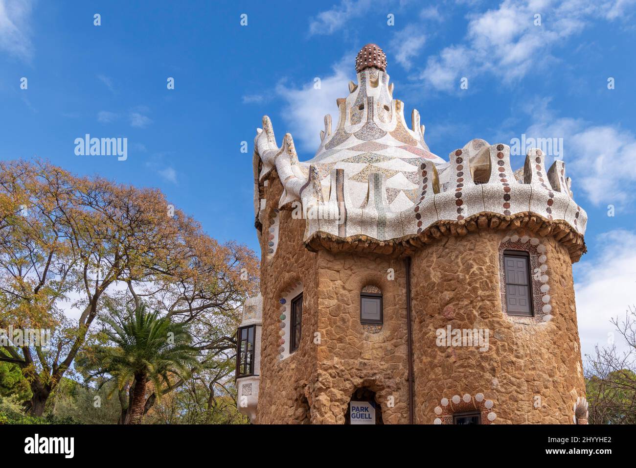 PARK GUELL BARCELONA CATALONIA SPAIN COLOURFUL GAUDI MOSAICS ON THE ROOF OF THE PORTER'S LODGE BUILDING Stock Photo