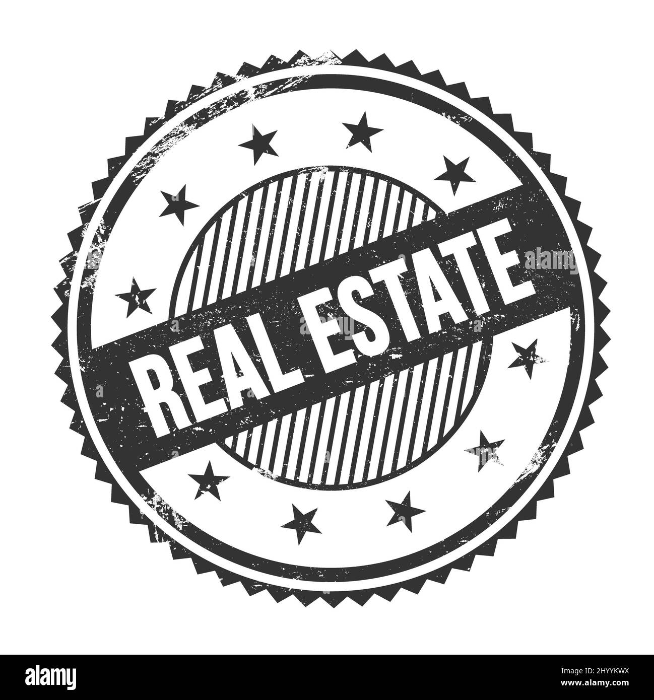 REAL ESTATE text written on black grungy zig zag borders round stamp