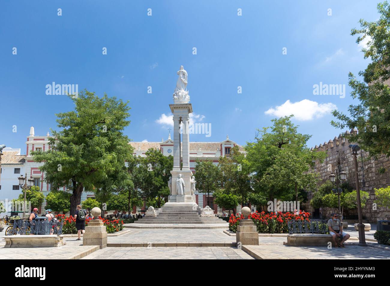 "Monumento a la Inmaculada" was inaugurated in 1918, is located in the small Plaza de Triumph with the Cathedral of Seville on one side Stock Photo