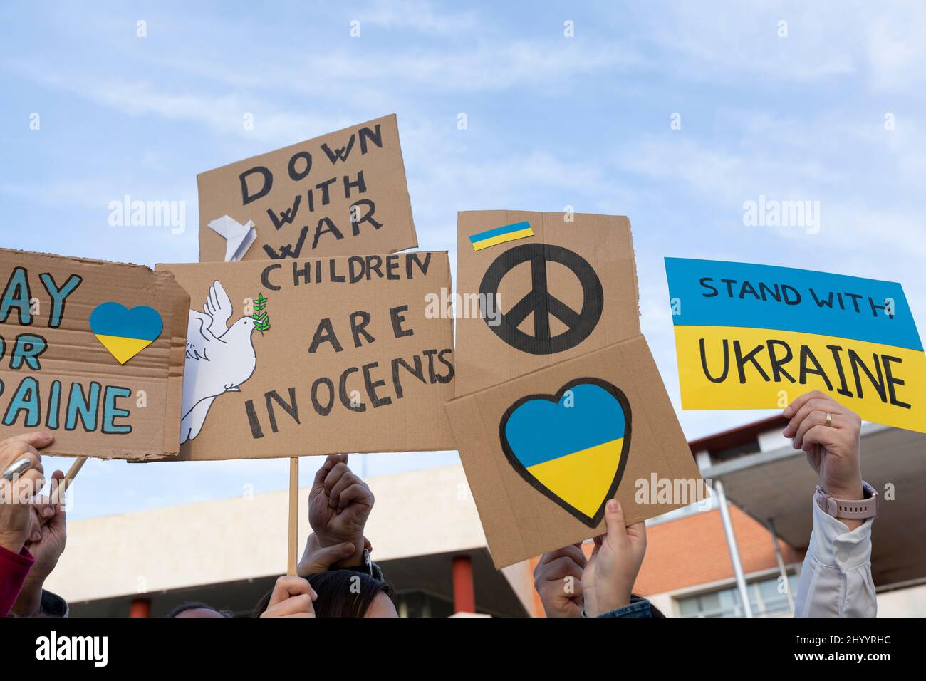 Different banners at the protest demonstration against the Russian invasion. Sign of peace, not war, and messages of solidarity and support for the Uk Stock Photo