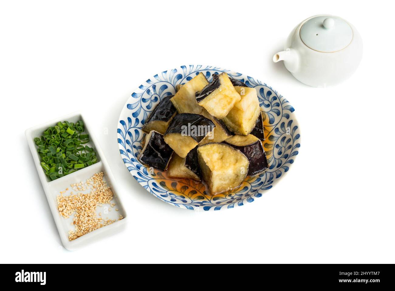 Japanese tempura style deep fried eggplant, isolated on white Stock