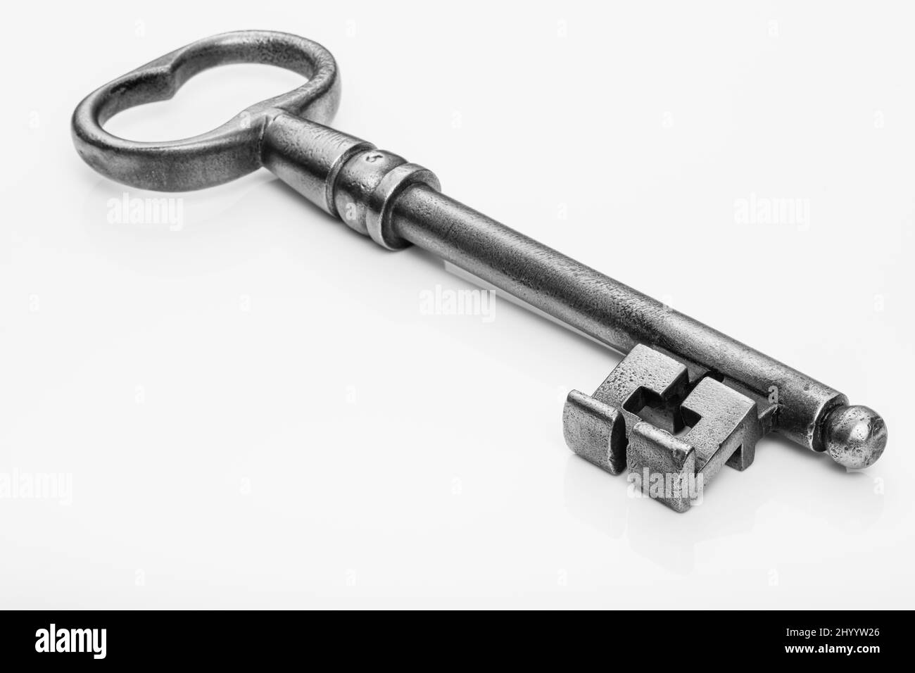 Antique forged key of a castle Stock Photo