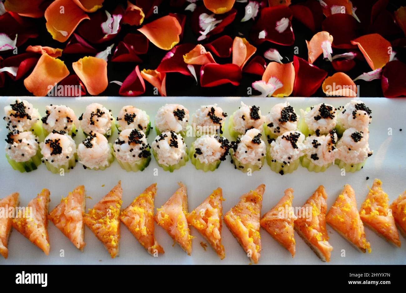 Selection of two cocktail hors d'oeuvre on decorated tray Stock Photo