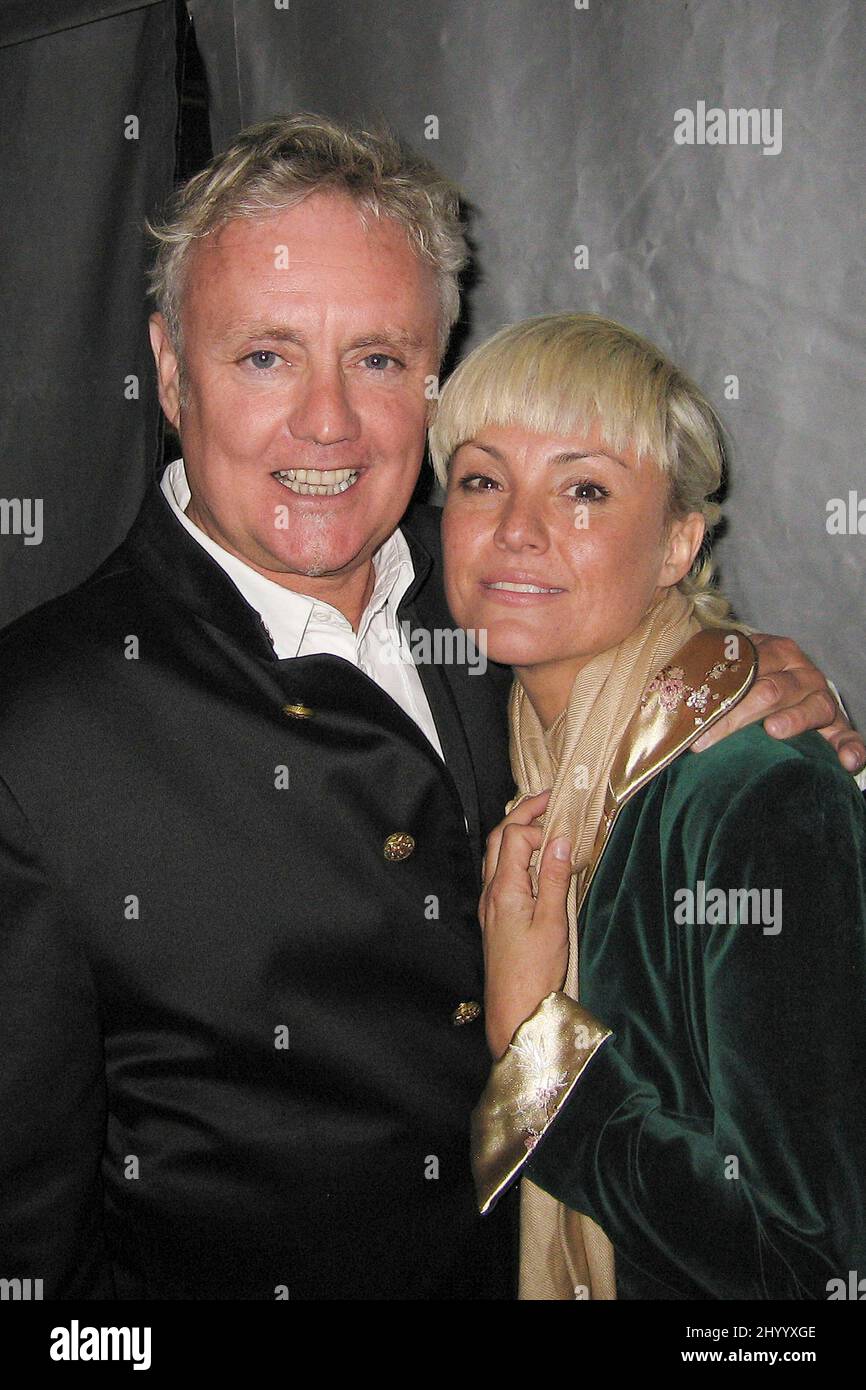 Roger Taylor,the drummer of Queen with his wife Sarina Potgieter backstage at the Band de Lac Charity Concert in Wintershall,Surrey 11th June 2005. Stock Photo