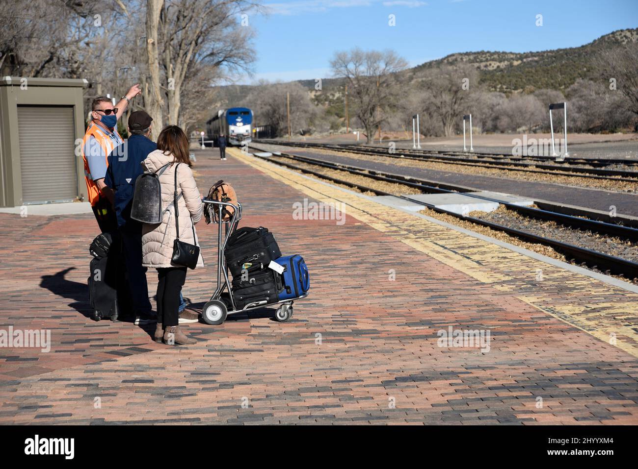 An Amtrak Southwest Chief passenger train arrives at the Amtrak station in Lamy, New Mexico, to pick up passengers headed west to Los Angeles. Stock Photo
