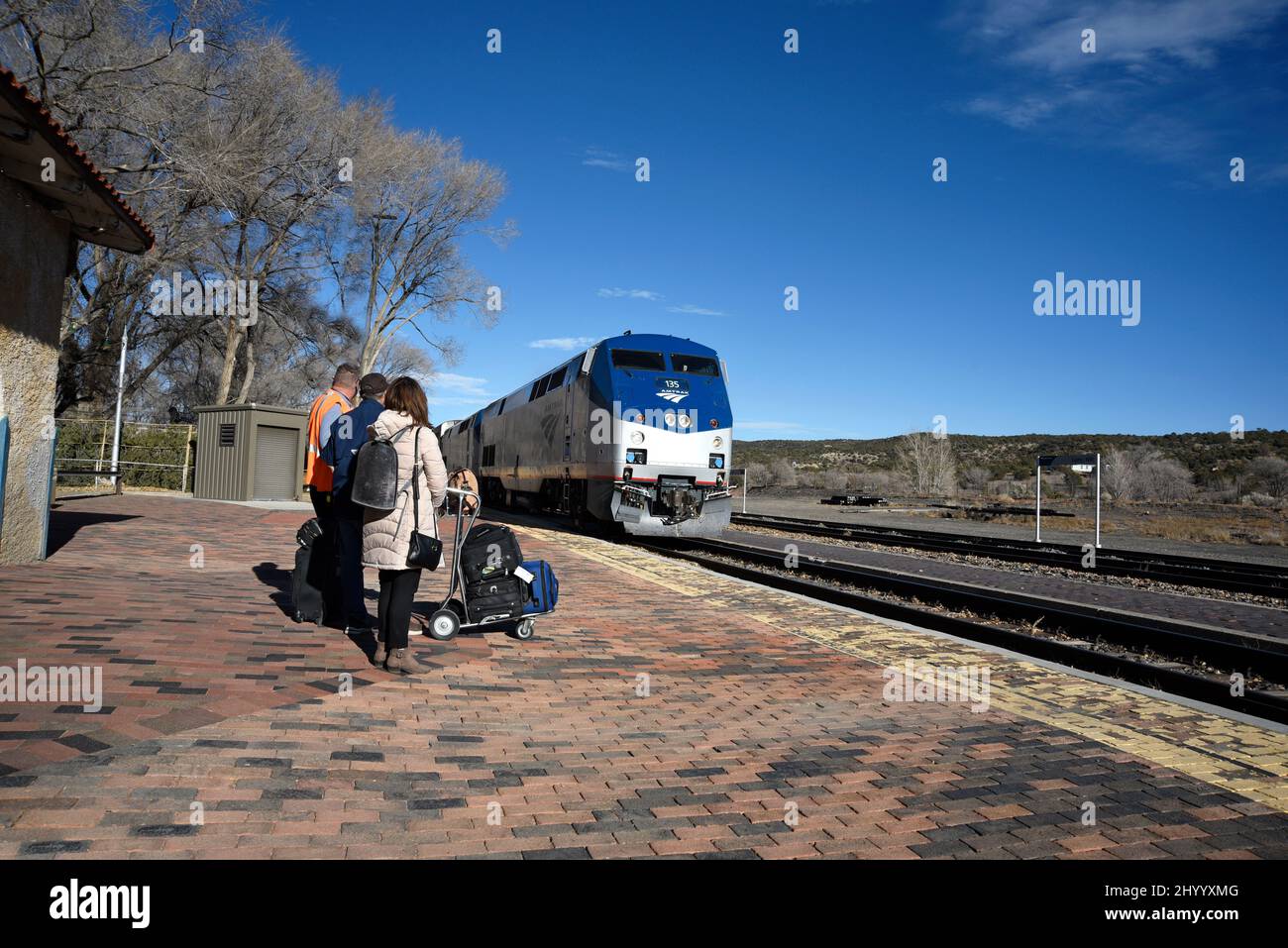 An Amtrak Southwest Chief passenger train arrives at the Amtrak station in Lamy, New Mexico, to pick up passengers headed west to Los Angeles. Stock Photo