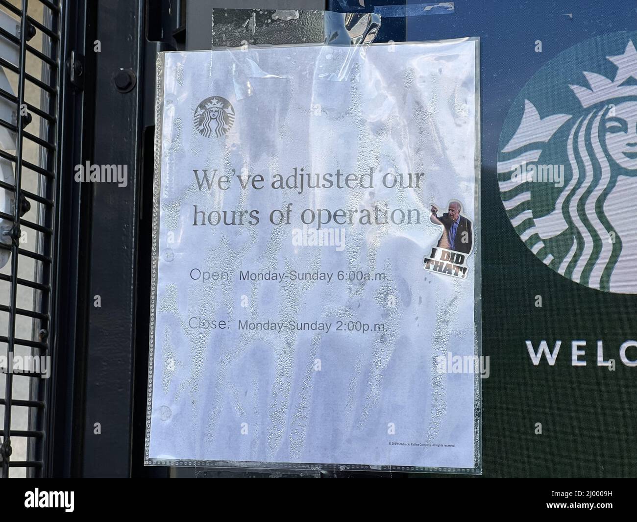 USA. 01st Jan, 2022. A satirical protest sticker critical of American President Joe Biden, with text reading I Did That, has been placed on an announcement about limited hours at a Starbucks cafe in Moraga, California, likely to imply responsibility for labor shortages, 2022. (Photo by Smith Collection/Gado/Sipa USA) Credit: Sipa USA/Alamy Live News Stock Photo