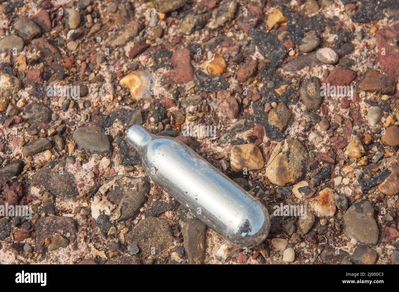 Nitrous oxide canister, illegal Rave, Dale Airfield, May 2010, Pembrokeshire, Wales, UK, Europe