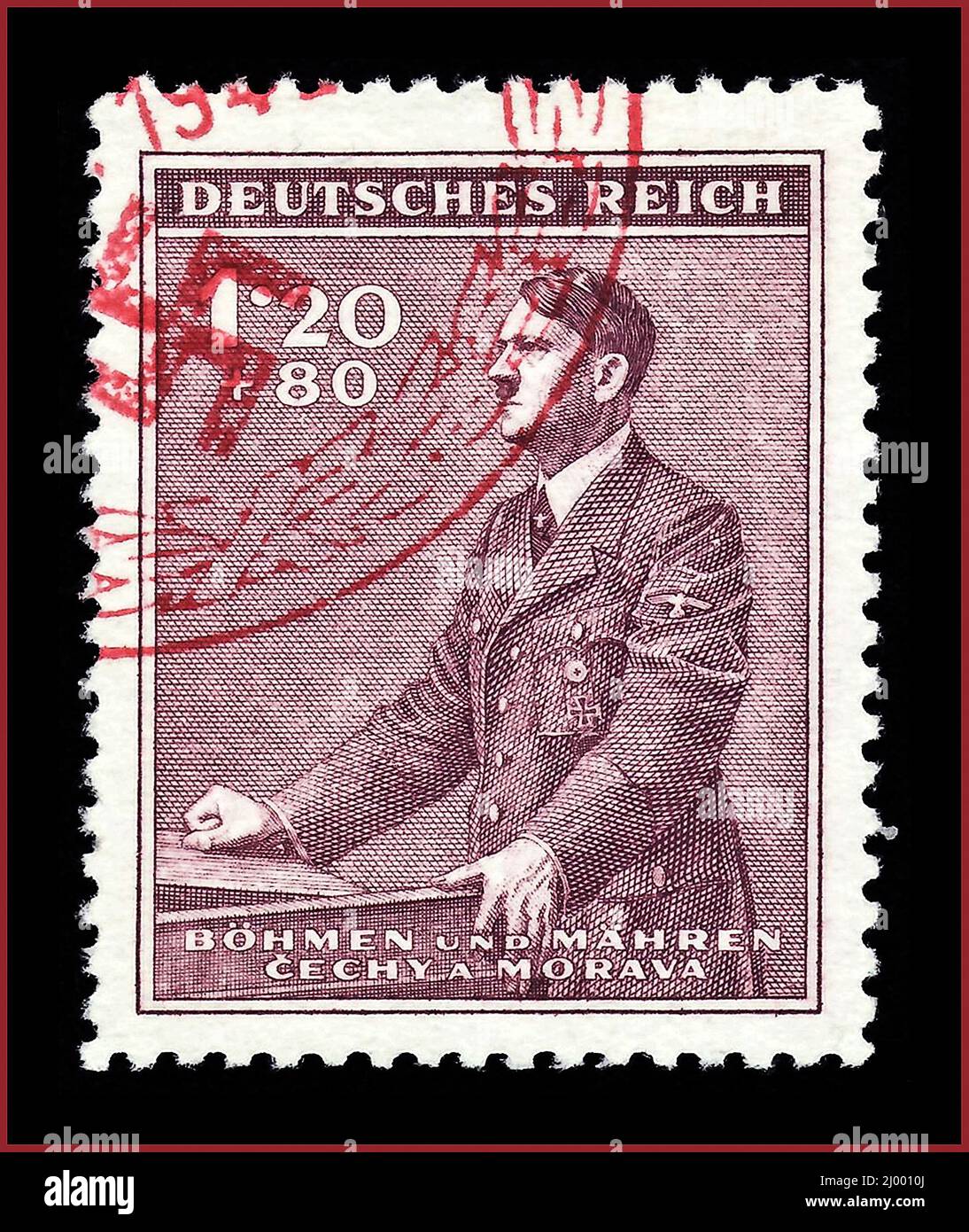 POSTAGE STAMP ADOLF HITLER Semi-postal surcharge stamp of the Nazi-German 'Protektorat Böhmen und Mähren' (Protectorate of Bohemia and Moravia); 1942; semi-postal stamp of the issue to the '53th anniversary of birth of the 'Führer'' Adolf Hitler; stamp motive shows Hitler at a lactern; The Nazi-protectorate 'Bohemia and Moravia' existed 1939-1945 from 15 March 1939 until to 8 May 1945 as part of homeland of the German Empire. Stock Photo