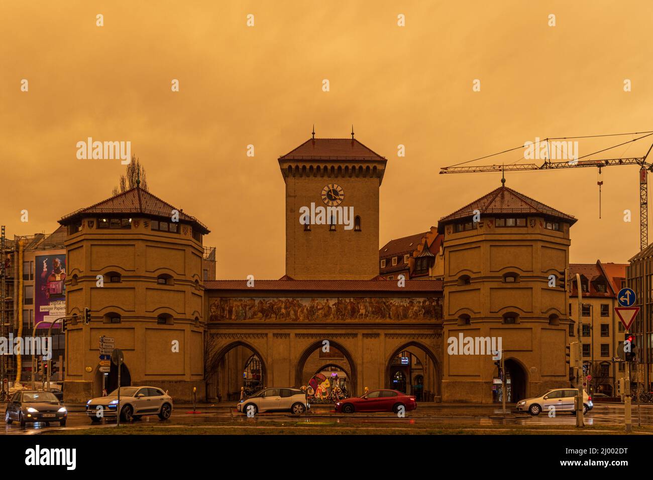 MUNICH, GERMANY - MARCH 15: A rare meteorological phenomenon causing an orange sky due to sahara sand dust in the sky on March 15, 2022 in Munich Stock Photo