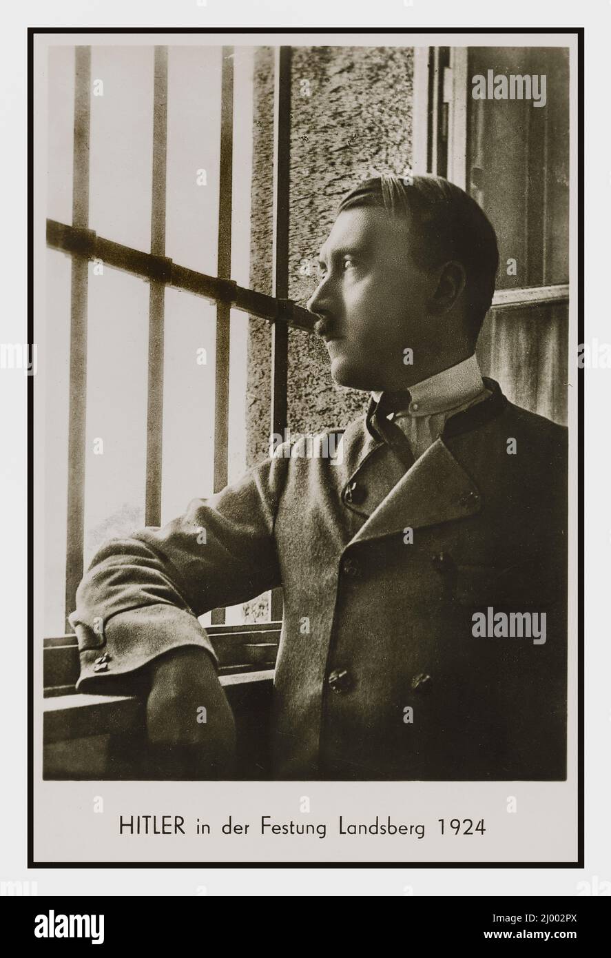 Adolf Hitler in the Landsberg Prison in 1924 It is best known as the prison where Adolf Hitler was held, after the failed Beer Hall Putsch in Munich, and where he dictated his memoirs Mein Kampf  to Rudolf Hess Stock Photo