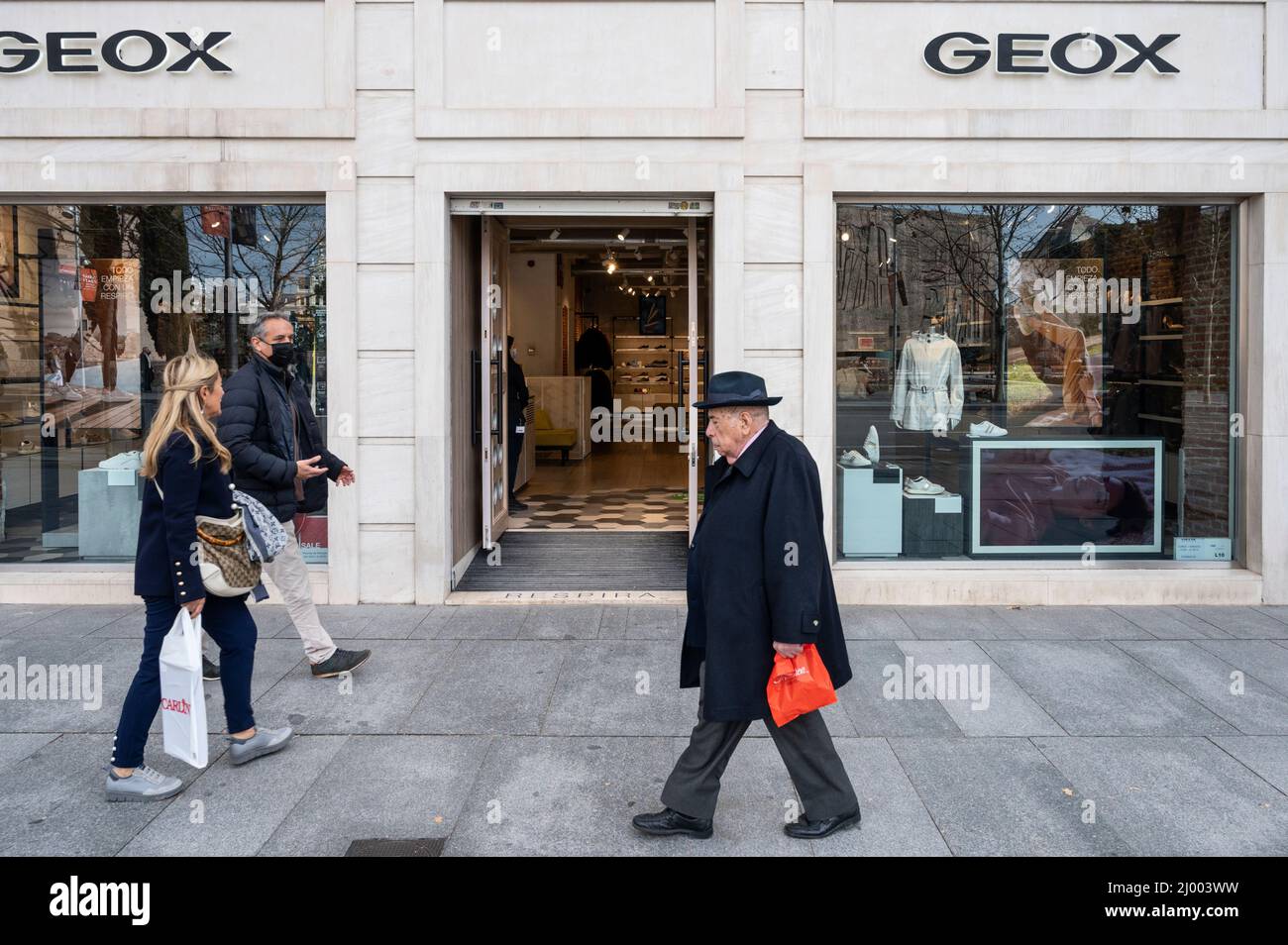 Pedestrians walk past the Italian footwear brand Geox store in Spain.  (Photo by Xavi Lopez/ SOPA Images/Sipa USA Stock Photo - Alamy