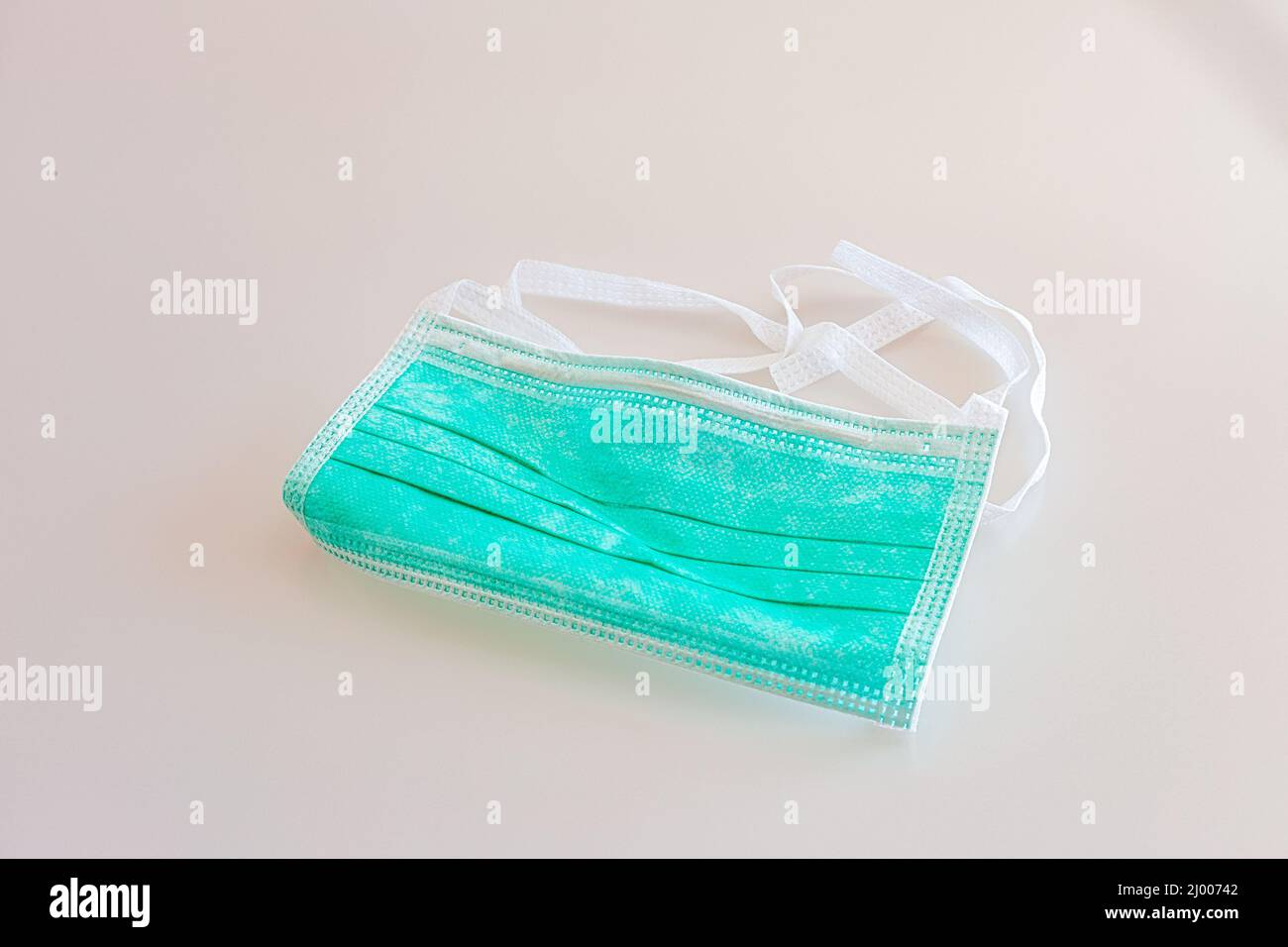 Surgical mask, protective medical device for mouth and nose Stock Photo