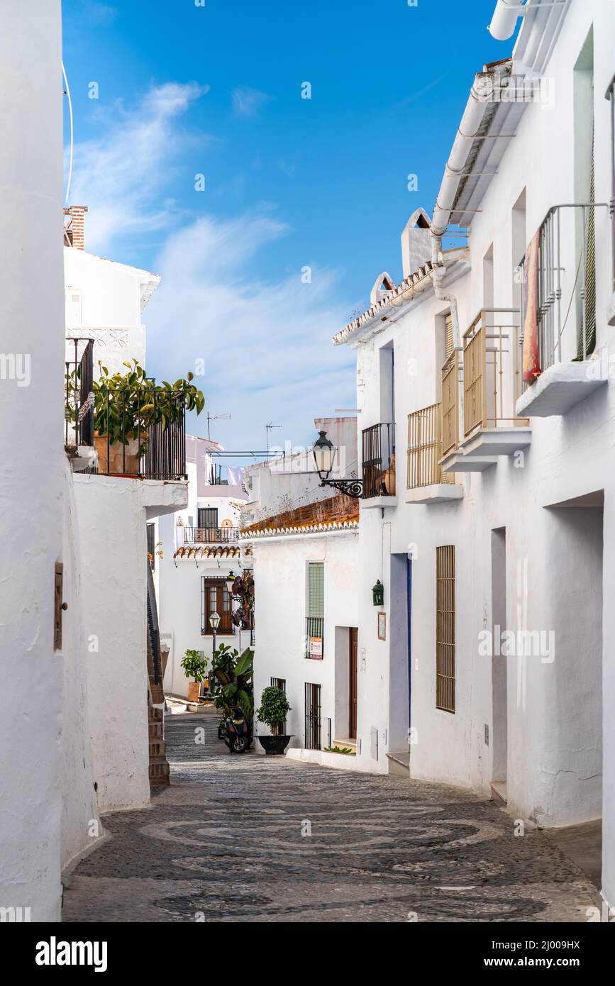 Frigiliana is a touristic travel destination, a village situated on the hills, with white houses, small roads. Stock Photo