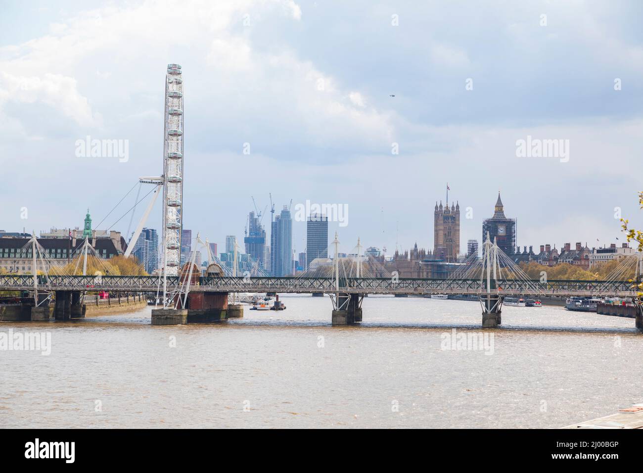 View from Waterloo Bridge towards Hungerford Bridge & Golden Jubilee Bridge in London, England. Stock Photo