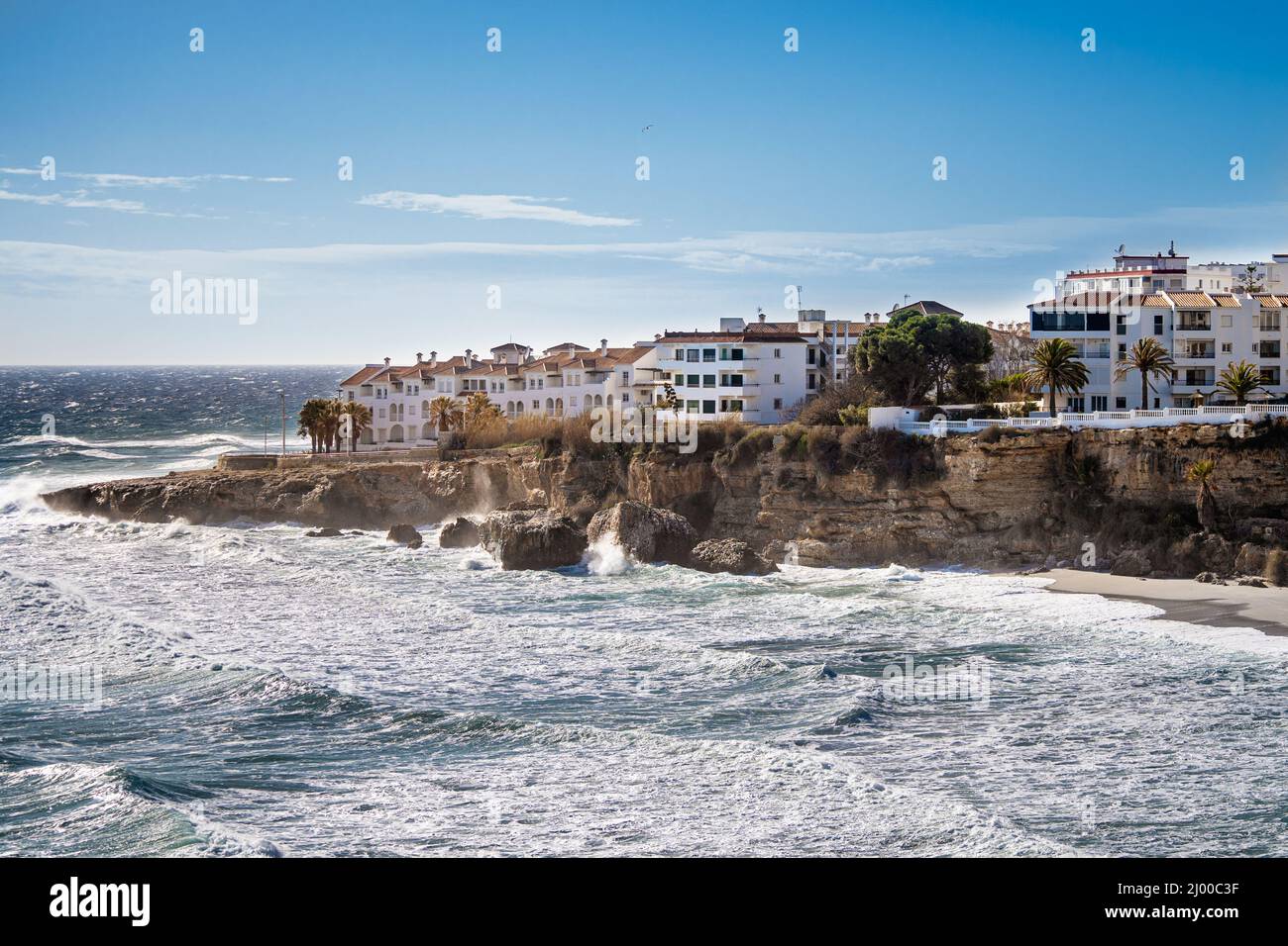 View of El Salon Beach in Nerja City - Malaga - Costa del Sol. View from 'Balcon de Europa'. Beautiful landscape in south of Spain. Stock Photo