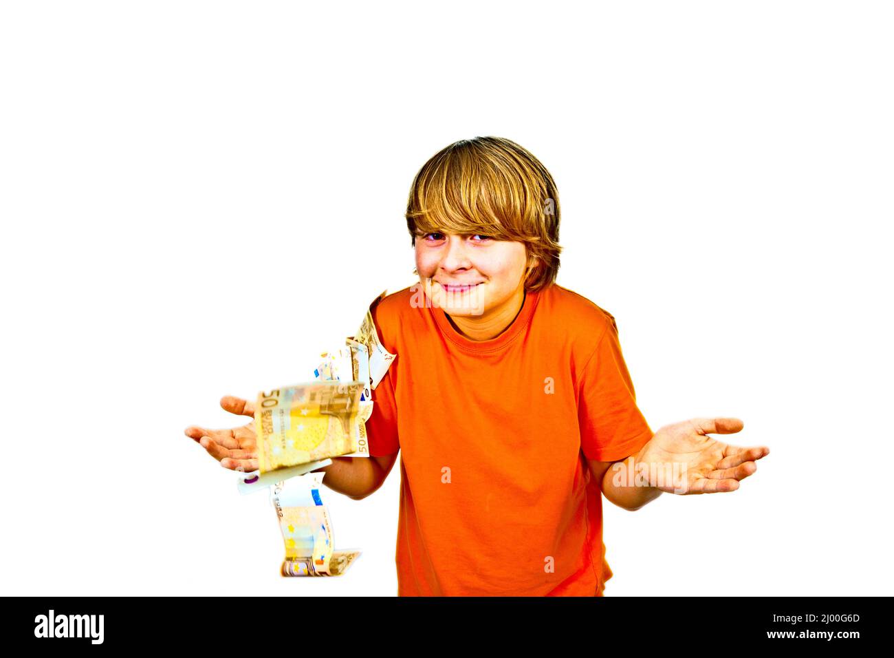 Euros flying around a boys head Stock Photo
