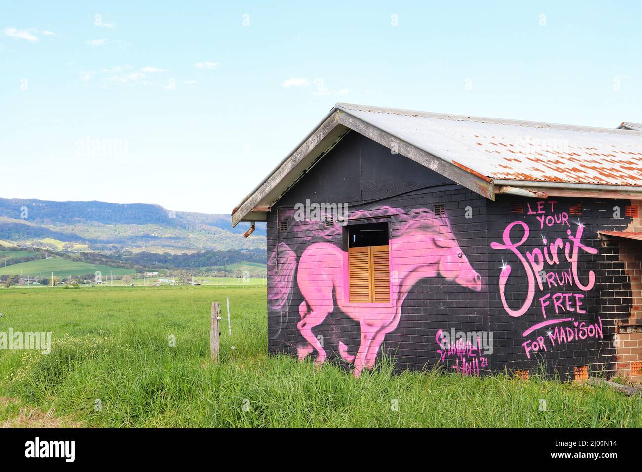 'Let your spirit run free for Madison' wall painting in an old house in Jamberoo, Australia Stock Photo