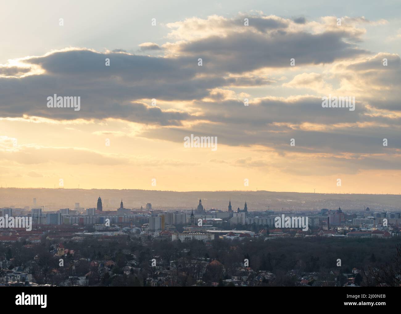 City of Dresden, view from the district Loschwitz in southwest direction to the city centre, where the numerous towers form a silhouette in the light Stock Photo