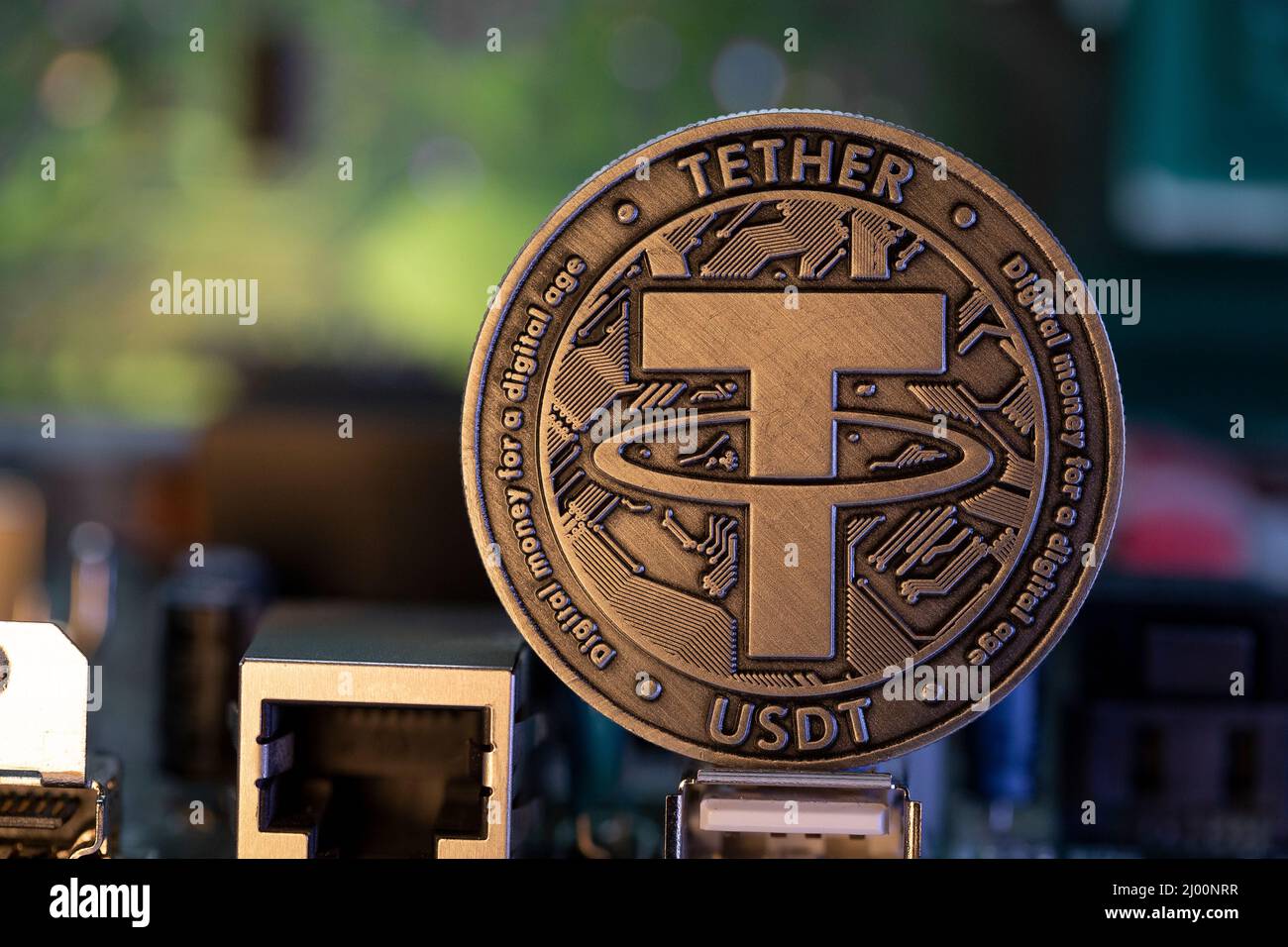 Tether USDT cryptocurrency physical coin placed on USB port and micro  scheme in the background. Macro Shot Stock Photo - Alamy